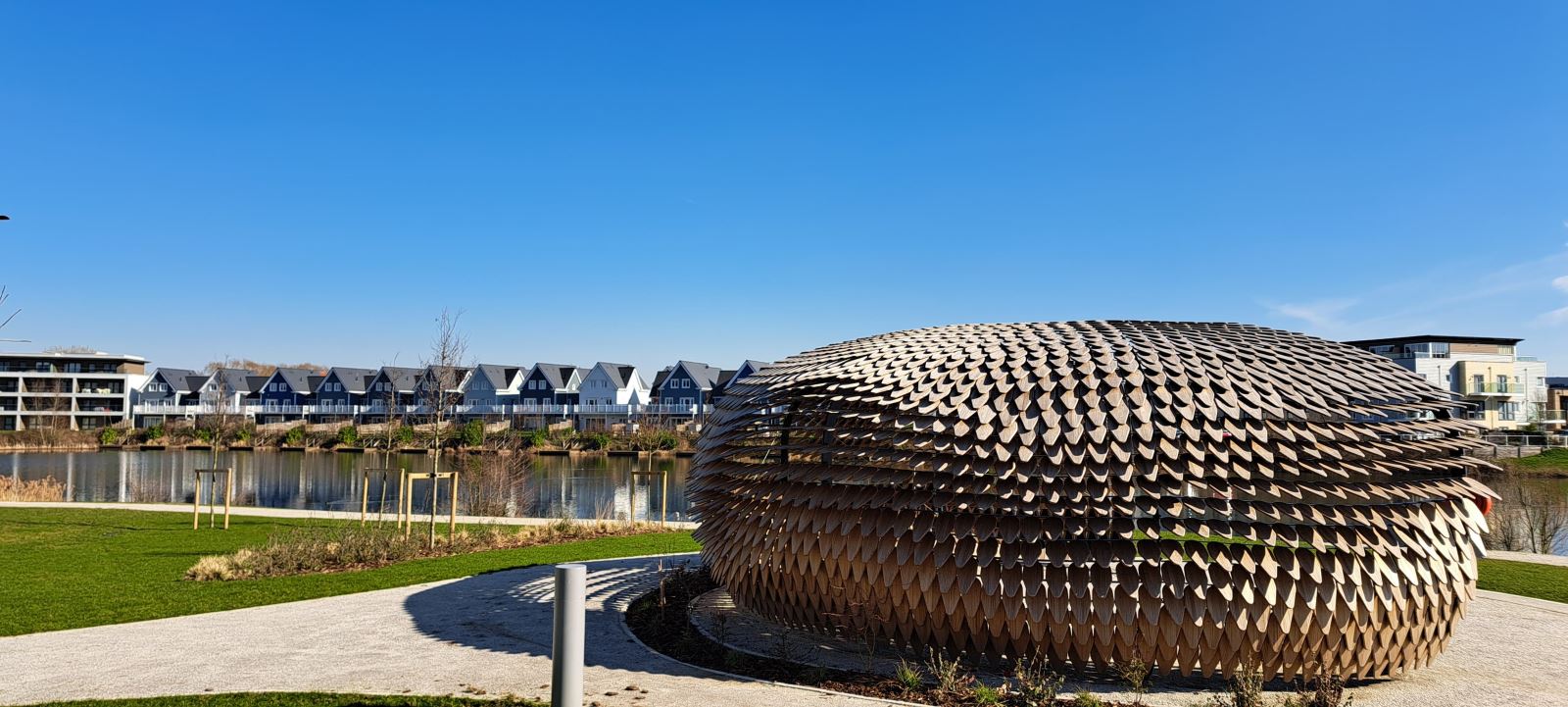 art piece, houses by lake